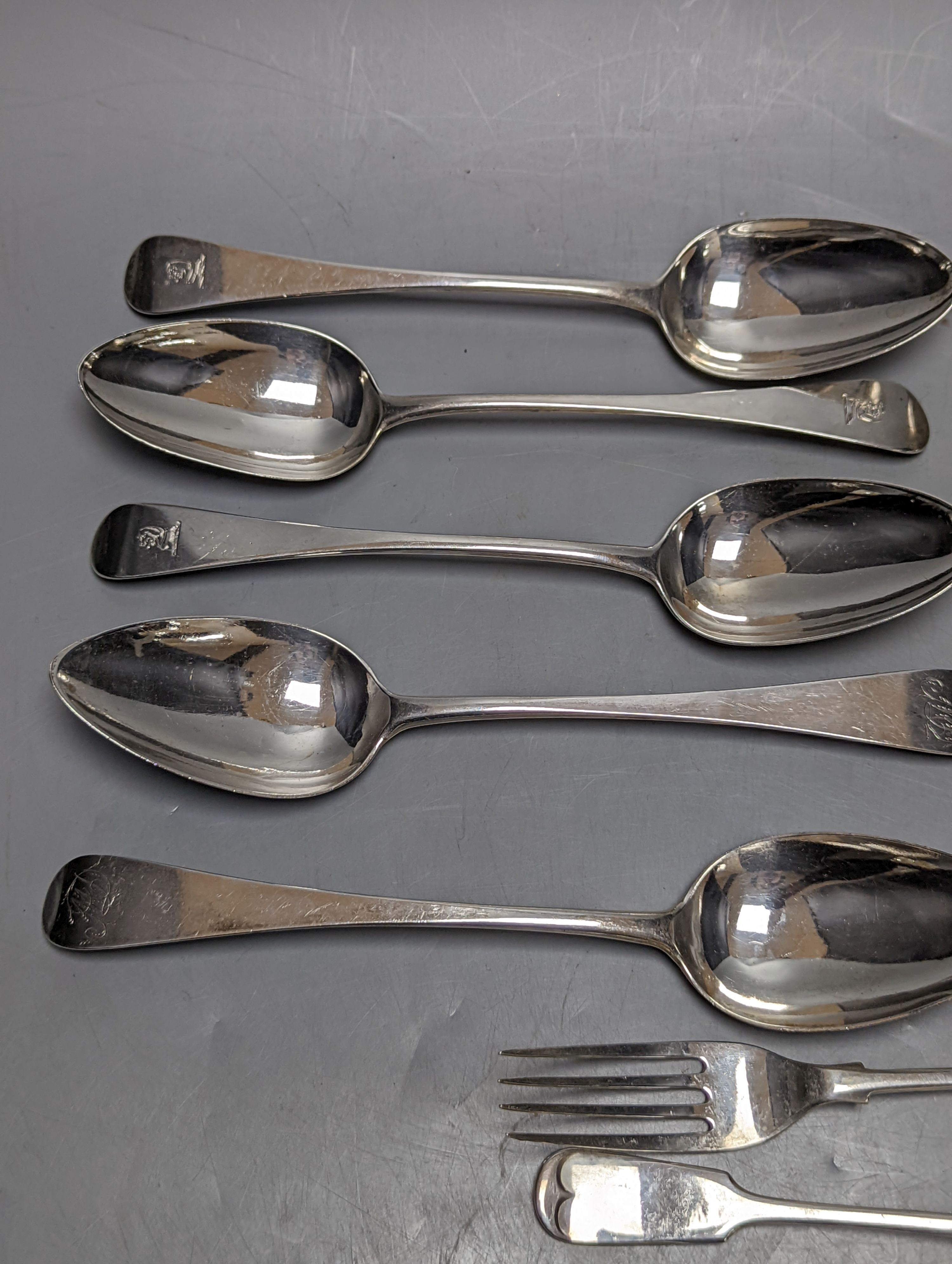 Fourteen items of 19th century and later silver flatware, various patterns, dates and maker's including three tablespoons by Eley & Fearn, London, 1817, 23oz.